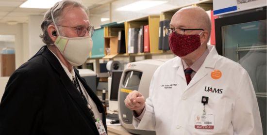 Dr Terry Harville Consults In Lab With Dr John Arthur Uams News